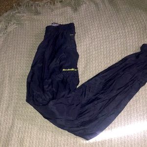 Reebok pants with pockets and zippers on the side of the lives(Windbreaker pants